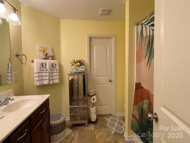 9608 Brackenview Ct, Charlotte, NC 28214 - full bath featuring vanity and baseboards