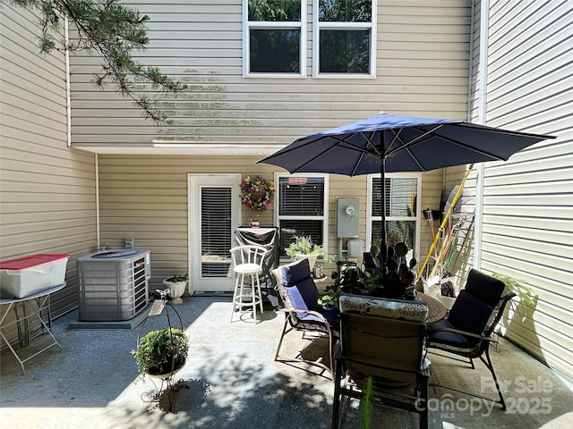 9608 Brackenview Ct, Charlotte, NC 28214 - view of patio with outdoor dining space