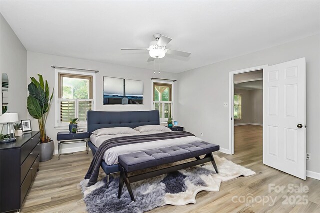 16509 Kimbolten Dr, Huntersville, NC 28078 - bedroom featuring light wood-type flooring and ceiling fan