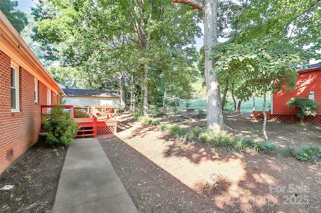 16509 Kimbolten Dr, Huntersville, NC 28078 - view of yard featuring a deck