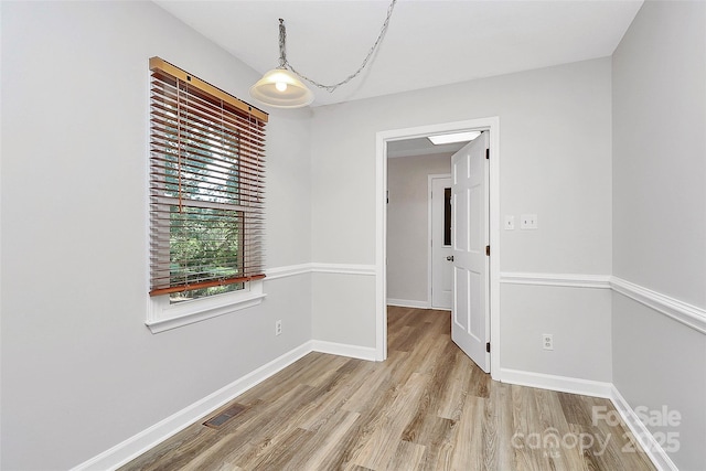 16509 Kimbolten Dr, Huntersville, NC 28078 - spare room with wood finished floors and baseboards