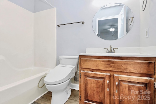 16509 Kimbolten Dr, Huntersville, NC 28078 - bathroom featuring vanity, wood finished floors, ceiling fan, and tub / shower combination