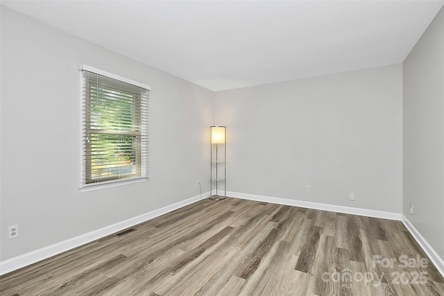 16509 Kimbolten Dr, Huntersville, NC 28078 - unfurnished room featuring wood finished floors and baseboards