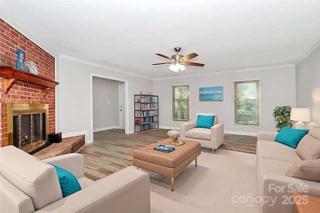 16509 Kimbolten Dr, Huntersville, NC 28078 - living area featuring wood finished floors, crown molding, ceiling fan, and a brick fireplace