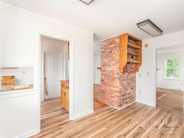 80 Gobblers Knob Dr, Clyde, NC 28721 - unfurnished living room featuring light wood-type flooring