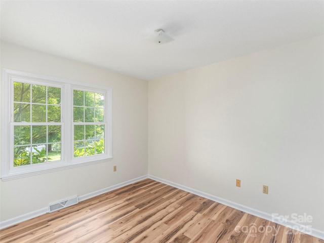 80 Gobblers Knob Dr, Clyde, NC 28721 - empty room with baseboards and light wood-type flooring