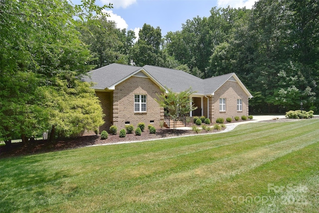 9117 Castle Garden Ln, Charlotte, NC 28215 - single story home with a front lawn and brick siding