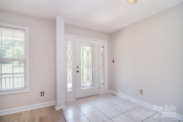 9117 Castle Garden Ln, Charlotte, NC 28215 - entryway with plenty of natural light and decorative columns