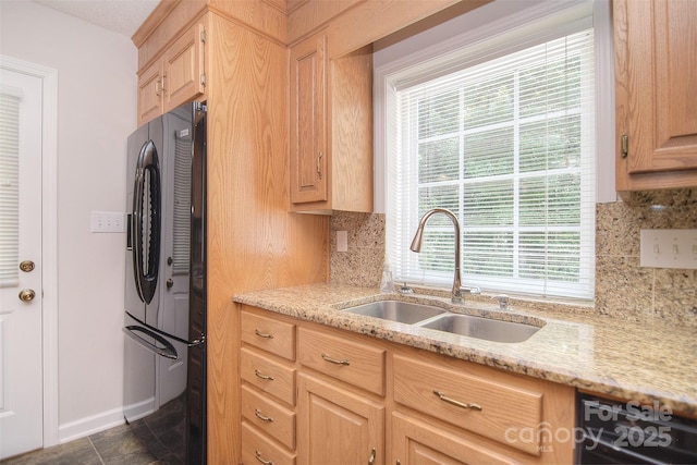 9117 Castle Garden Ln, Charlotte, NC 28215 - kitchen featuring black fridge, light brown cabinets, decorative backsplash, and dishwasher