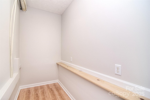 9117 Castle Garden Ln, Charlotte, NC 28215 - walk in closet featuring light wood-style floors