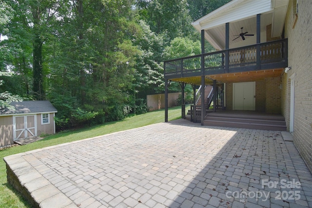 9117 Castle Garden Ln, Charlotte, NC 28215 - view of patio / terrace with ceiling fan, a storage unit, stairway, and a deck