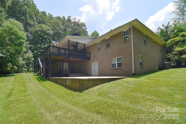 9117 Castle Garden Ln, Charlotte, NC 28215 - back of property with ceiling fan, a yard, stairway, a deck, and a patio