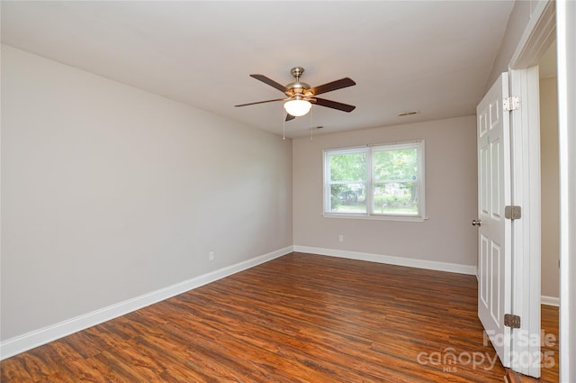 5424 Amado St, Charlotte, NC 28215 - empty room with a ceiling fan and dark wood-type flooring