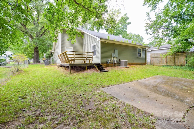 5424 Amado St, Charlotte, NC 28215 - rear view of property featuring a wooden deck, a fenced backyard, and a patio