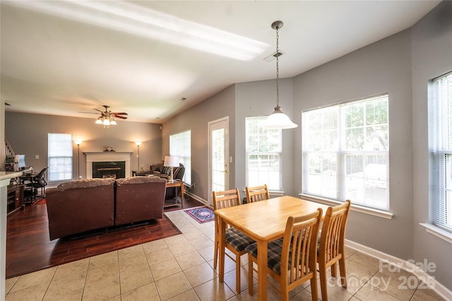 219 Harrowfield Hts, York, SC 29745 - tiled dining space featuring a fireplace and a ceiling fan