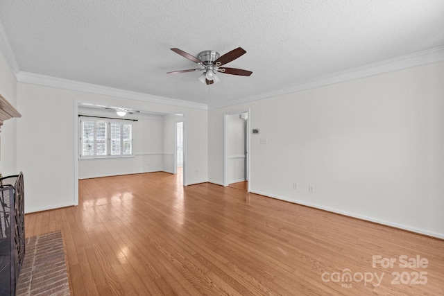 9121 Four Acre Ct, Charlotte, NC 28210 - unfurnished living room featuring a ceiling fan, hardwood / wood-style flooring, a textured ceiling, and ornamental molding