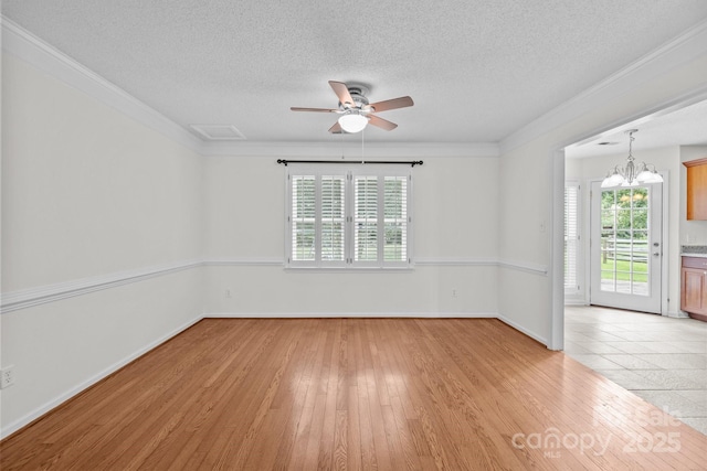 9121 Four Acre Ct, Charlotte, NC 28210 - unfurnished room featuring light wood finished floors, ceiling fan, a textured ceiling, a chandelier, and ornamental molding