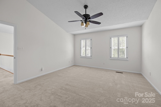 9121 Four Acre Ct, Charlotte, NC 28210 - empty room featuring carpet flooring, a textured ceiling, and a ceiling fan
