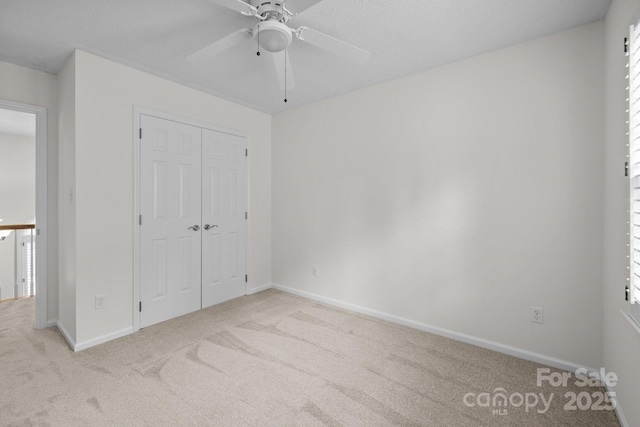 9121 Four Acre Ct, Charlotte, NC 28210 - unfurnished bedroom with carpet floors, a closet, and ceiling fan