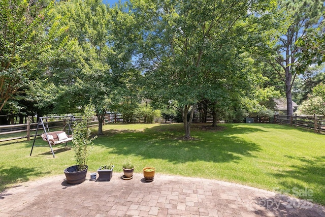 9121 Four Acre Ct, Charlotte, NC 28210 - fenced backyard featuring a patio