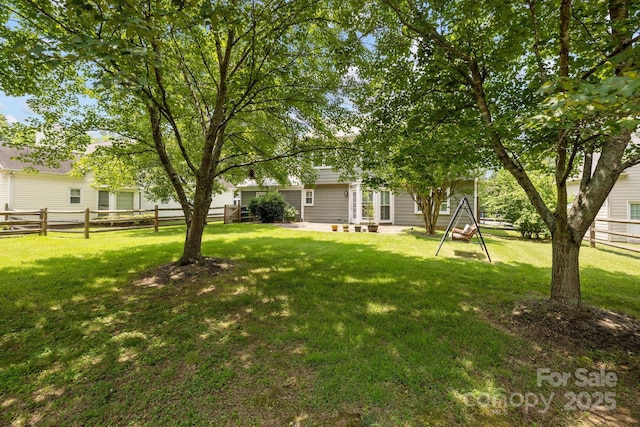9121 Four Acre Ct, Charlotte, NC 28210 - fenced backyard with a patio