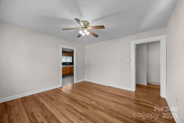 109 Short St, Waynesville, NC 28786 - unfurnished room with a ceiling fan and wood finished floors