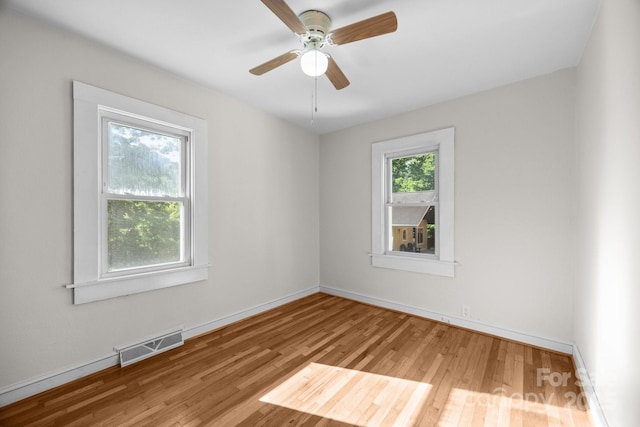 109 Short St, Waynesville, NC 28786 - spare room featuring wood finished floors and a ceiling fan