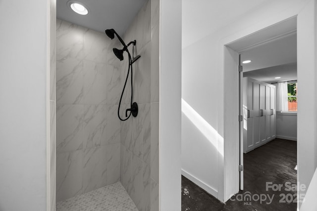109 Short St, Waynesville, NC 28786 - bathroom featuring tiled shower and recessed lighting