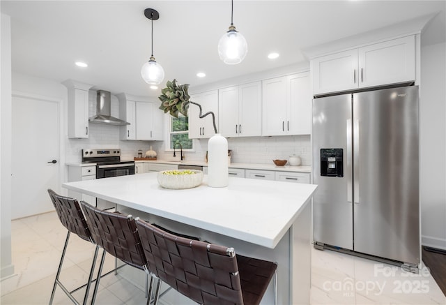 4017 Sulkirk Rd, Charlotte, NC 28210 - kitchen featuring stainless steel appliances, wall chimney exhaust hood, light countertops, tasteful backsplash, and recessed lighting
