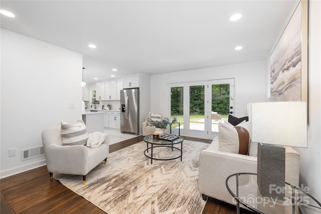 4017 Sulkirk Rd, Charlotte, NC 28210 - living room with light wood finished floors and recessed lighting