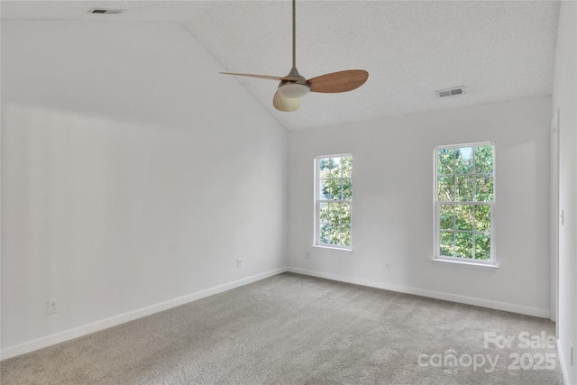 11407 Lenswood Ct, Charlotte, NC 28214 - empty room featuring ceiling fan, lofted ceiling, and carpet flooring