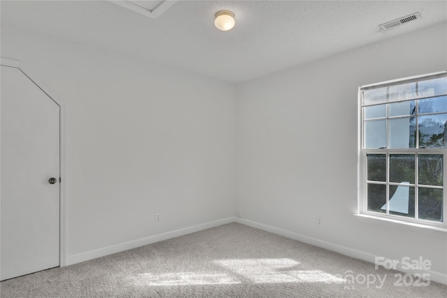 11407 Lenswood Ct, Charlotte, NC 28214 - carpeted spare room featuring baseboards