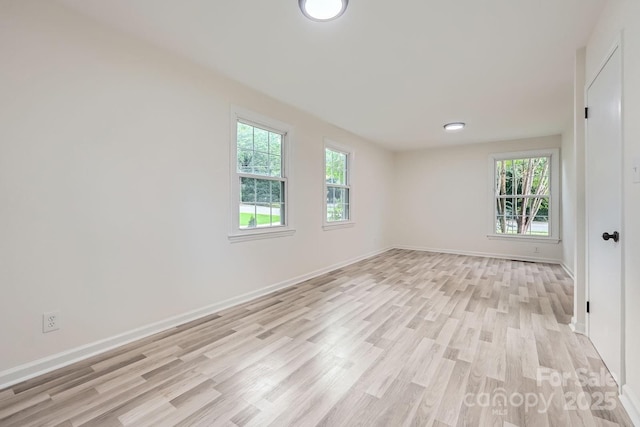 1224 E Woodlawn Rd, Charlotte, NC 28209 - spare room with light wood finished floors and baseboards