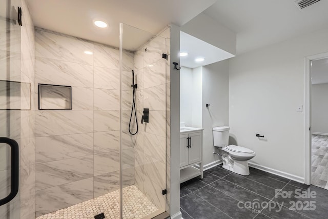 1224 E Woodlawn Rd, Charlotte, NC 28209 - bathroom featuring a shower stall, vanity, tile patterned floors, and recessed lighting