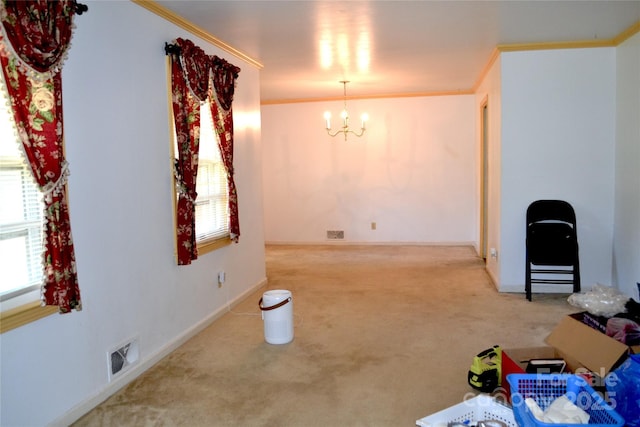 405 Wesley Heights Dr, Albemarle, NC 28001 - carpeted empty room with a chandelier and crown molding