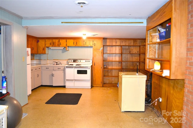 405 Wesley Heights Dr, Albemarle, NC 28001 - kitchen with white appliances, light countertops, white cabinets, and crown molding