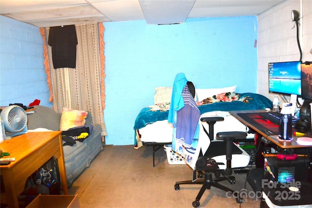 405 Wesley Heights Dr, Albemarle, NC 28001 - bedroom with concrete block wall and concrete flooring