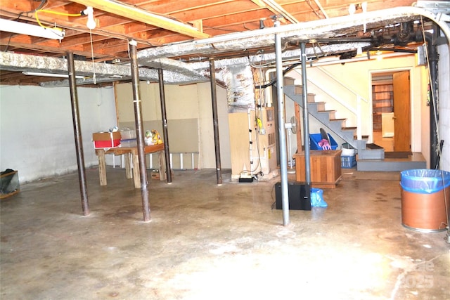 405 Wesley Heights Dr, Albemarle, NC 28001 - unfinished basement featuring stairway