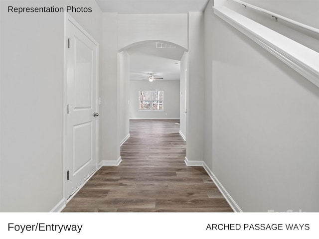 217 Lake George Dr, Shelby, NC 28152 - hall with arched walkways and wood finished floors