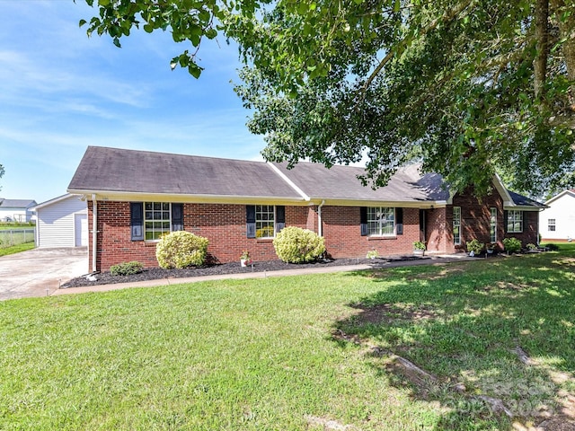 5105 Hampton Meadows Rd, Monroe, NC 28110 - ranch-style home featuring brick siding and a front yard
