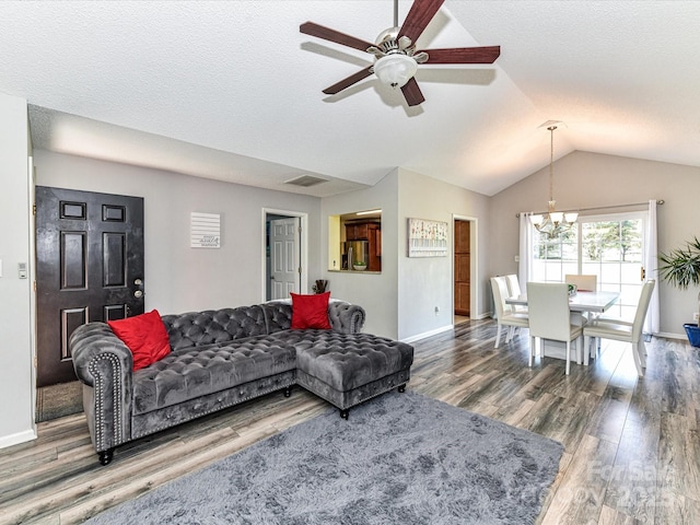5105 Hampton Meadows Rd, Monroe, NC 28110 - living room featuring a chandelier, wood finished floors, lofted ceiling, a ceiling fan, and a textured ceiling