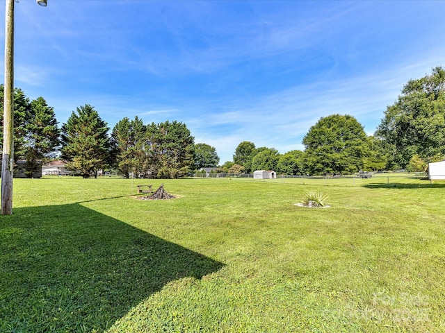 5105 Hampton Meadows Rd, Monroe, NC 28110 - view of grassy yard featuring a shed