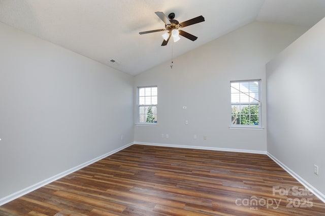 5806 Autumn Trace Ln, Indian Trail, NC 28079 - empty room featuring a ceiling fan, dark wood finished floors, and high vaulted ceiling