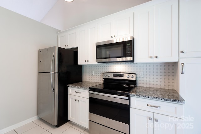 5806 Autumn Trace Ln, Indian Trail, NC 28079 - kitchen with stainless steel appliances, light tile patterned floors, backsplash, and stone counters