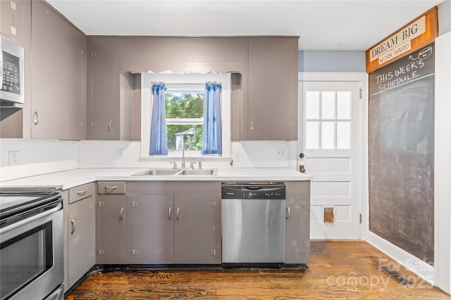 506 Gold St, Shelby, NC 28150 - kitchen with appliances with stainless steel finishes, gray cabinets, dark wood-style floors, and light countertops