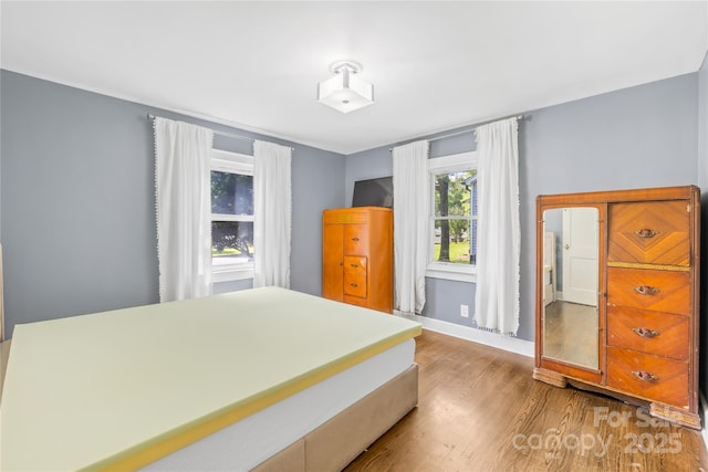 506 Gold St, Shelby, NC 28150 - bedroom with wood finished floors and baseboards