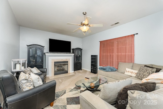 7218 Cascading Pines Dr, Fort Mill, SC 29708 - living area featuring light colored carpet, ceiling fan, and a premium fireplace