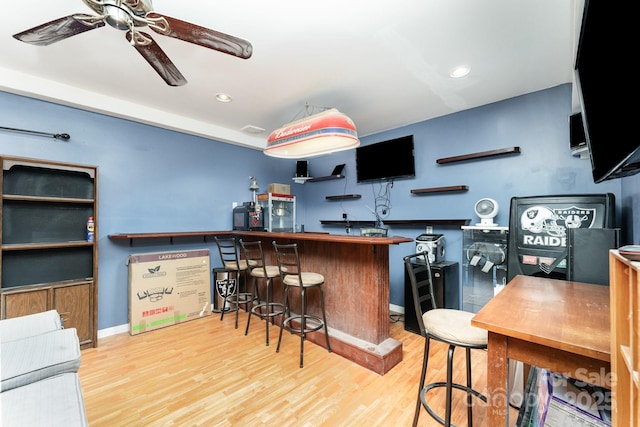 7218 Cascading Pines Dr, Fort Mill, SC 29708 - indoor dry bar featuring ceiling fan, wood finished floors, and recessed lighting
