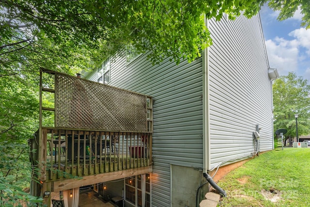 7218 Cascading Pines Dr, Fort Mill, SC 29708 - view of side of property featuring a deck and a lawn
