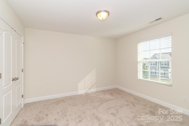 4357 Hornyak Dr, Monroe, NC 28110 - unfurnished room with carpet floors and baseboards